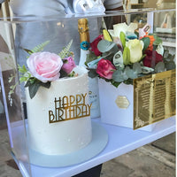 Glass Box with Cake and Champgne