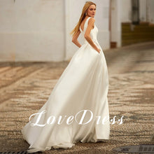 Load image into Gallery viewer, Deep V-Neck Sleeveless Wedding Dress
